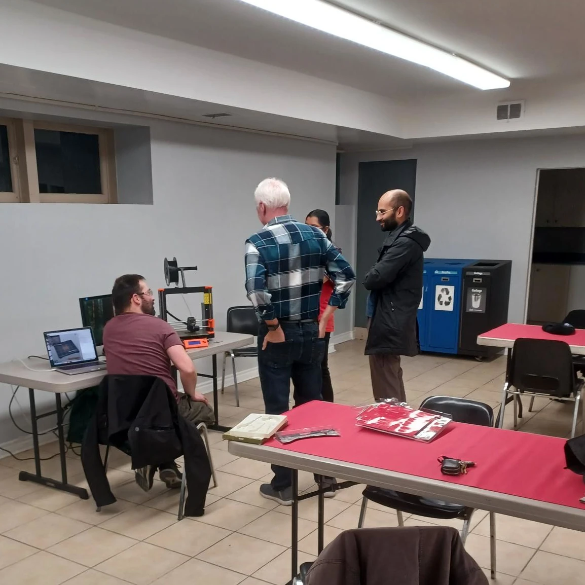 Participants working on projects during MiMake Monday at Erindale Community Hall